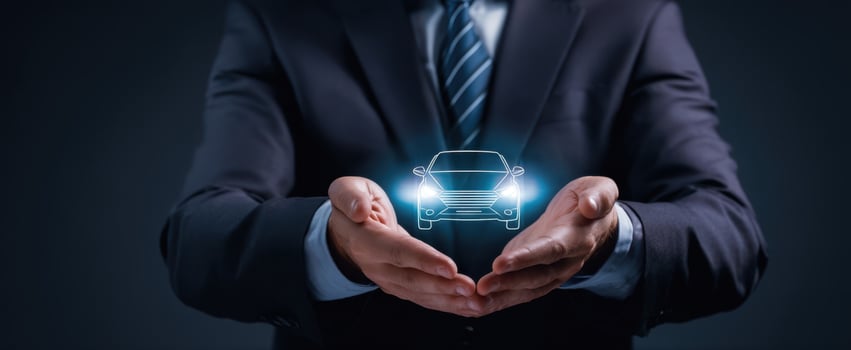 The businessman presenting a futuristic hologram of a car in his hands. photo