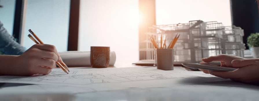 The teamwork involved in architectural design and planning process at a modern workspace. photo