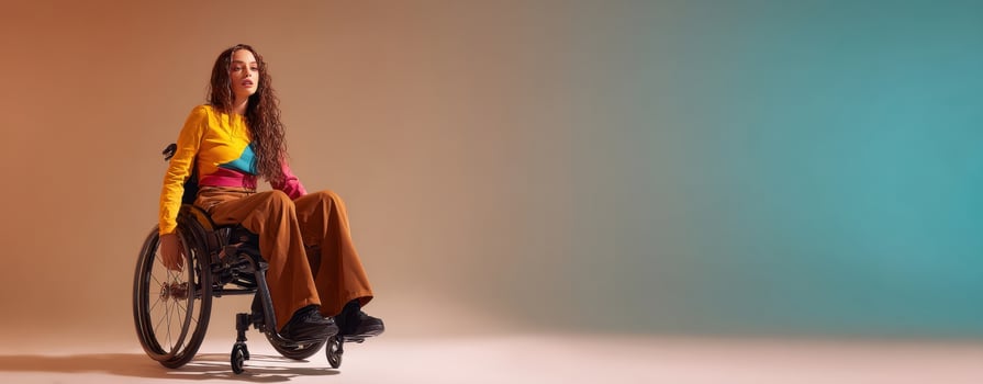 The confident woman in a wheelchair embracing her vibrant style and empowerment. photo