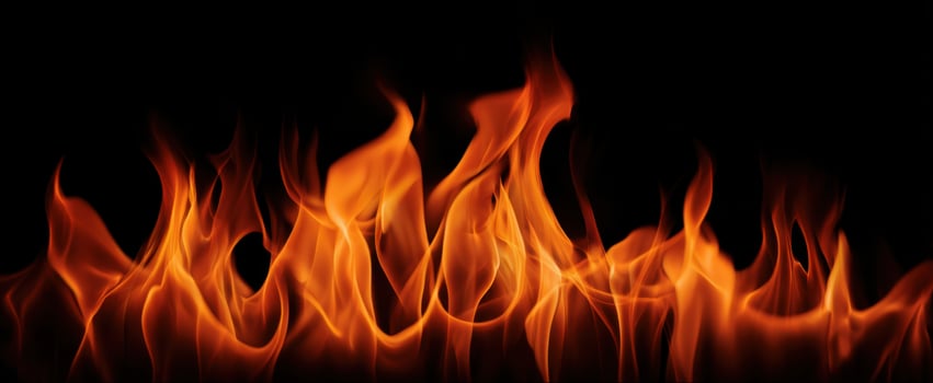 The dancing flames of fire creating a mesmerizing and warm ambiance. photo