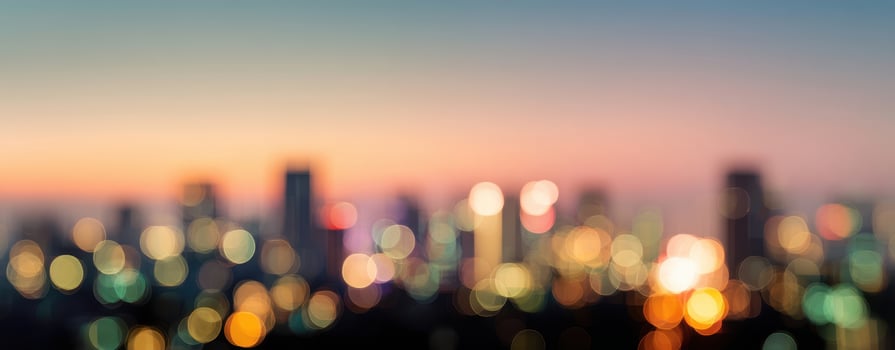 The Blurred Cityscape at Dusk with Beautiful Bokeh Lights photo