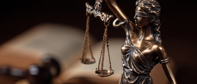 The statue of Lady Justice holding the scales of law elegantly and symbolically. photo