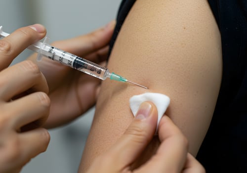 Injection administered to person photo