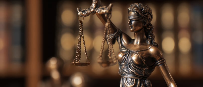 The statue of Lady Justice holding scales in a dignified and elegant manner. photo