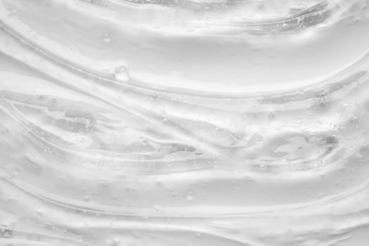 A close up of a white liquid with bubbles photo