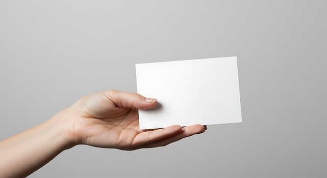 Card in Hand - Blank White Mockup photo