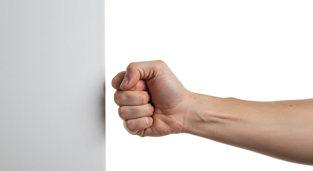 Hand Fist Knocking on White Panel photo