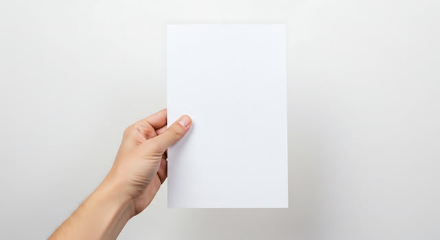 Blank White Paper Being Held photo