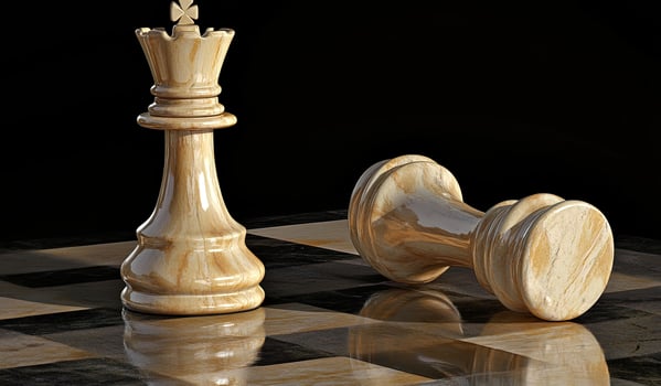 Two chess pieces, a queen and a rook, on a chessboard photo
