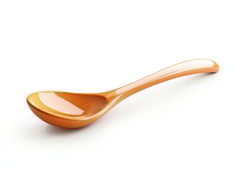 Orange wooden spoon on white background photo