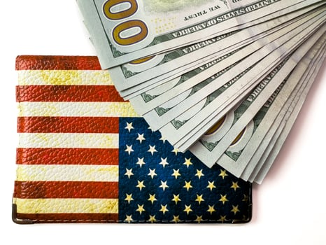 US flag and dollars, cash, dollars, US passport, US visa, travel to the US money cash photo