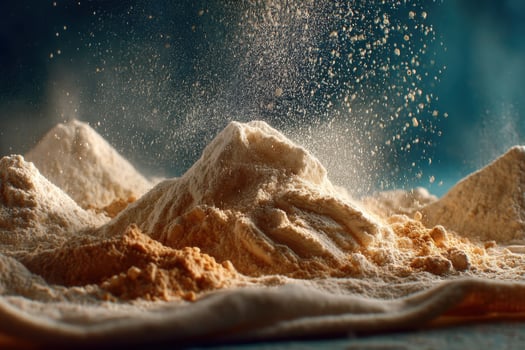 A pile of flour with powder coming out of it photo