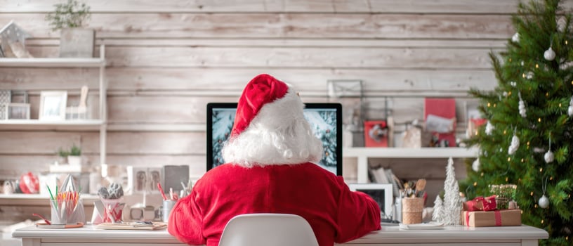 The Santa Claus Working at a Festively Decorated Christmas Desk photo