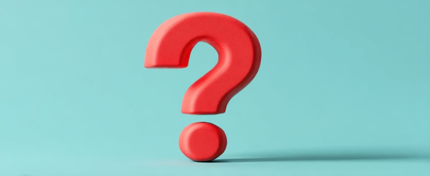The Bold Red Question Mark Against a Light Blue Background photo