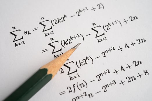 Pencil on mathematic formula exercise paper photo