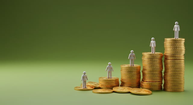 Golden coins stacked on top of each other with people standing on top photo