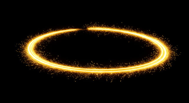 A circle of sparkles on a black background photo