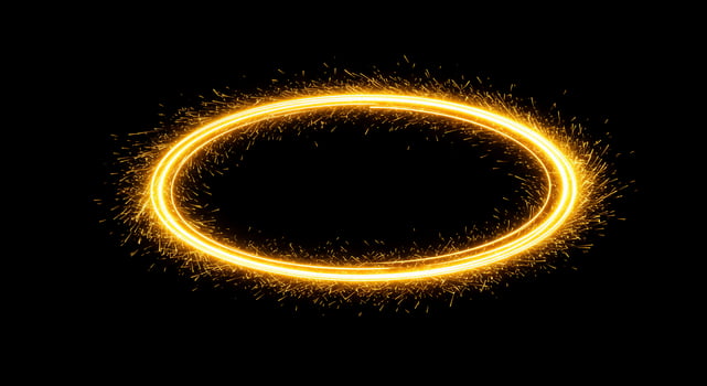 A circle of glowing sparks on a black background photo