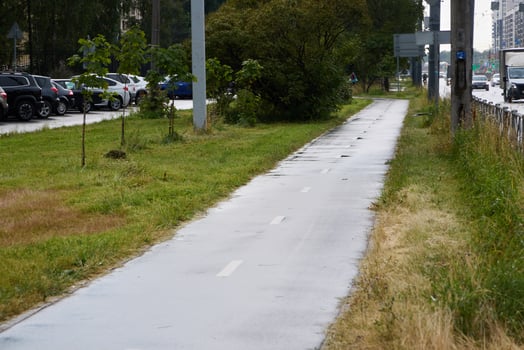A Bicycle Path Designed to Run Alongside an Urban Roadway Enhancing Travel and Leisure Experiences photo