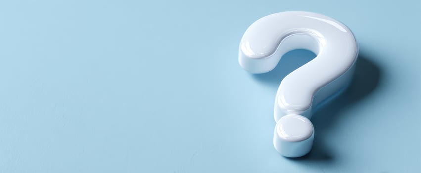 The White Question Mark on a Soft Blue Background Expressing Curiosity Ideas photo