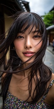 A woman with long hair and a flower print dress photo