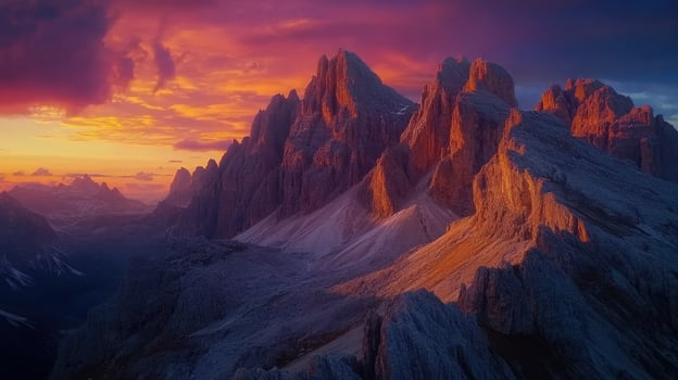Dramatic mountain peaks at sunset photo