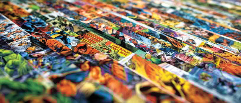 The vibrant collection of superhero comic book pages spread out beautifully. photo