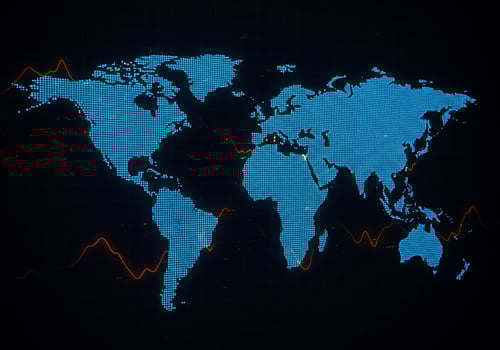 Blue map with orange curves showing data points, on a black background photo