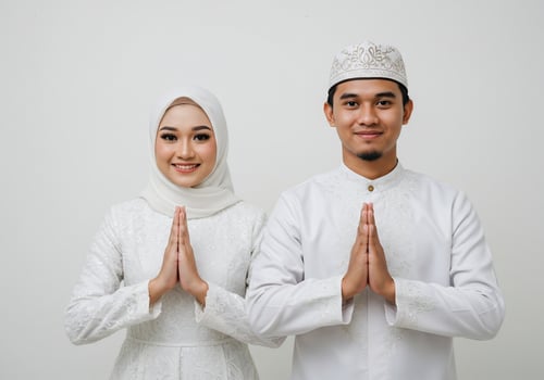 Muslim couple in traditional clothes photo