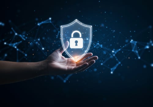 Cyber security illustration of hand holding shield with lock on dark background photo