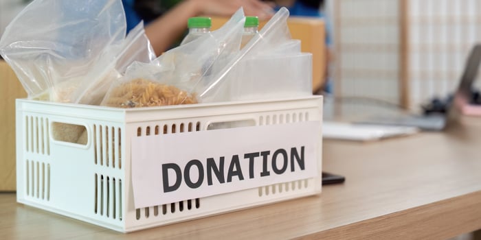 Donation box filled with items for community support and charity photo