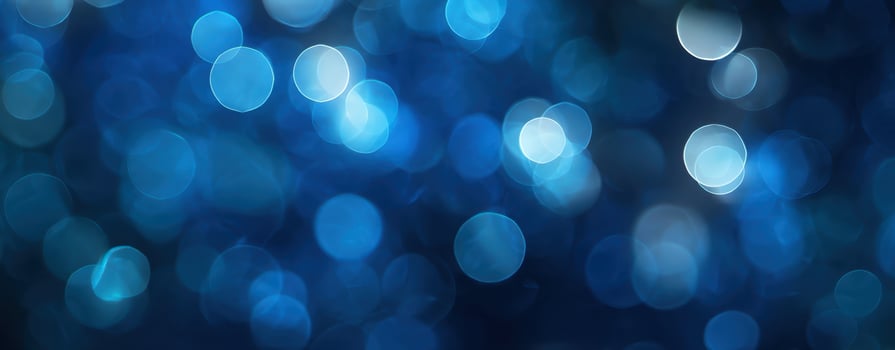 The shimmering blue bokeh background with soft, dreamy light effects. photo