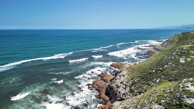 Experience the stunning coastal views that showcase the serene ocean and the rugged shores photo