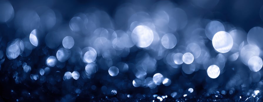 The mesmerizing blue bokeh captures the essence of serene water reflections. photo