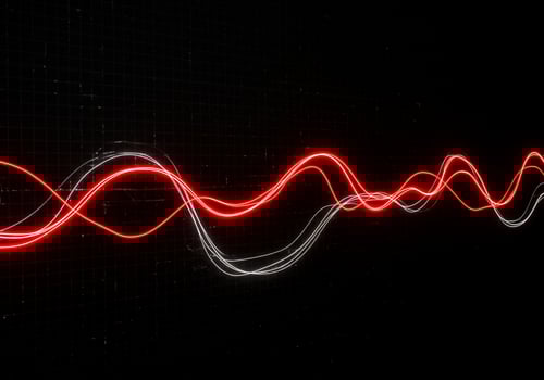 Red and white abstract light trails over dark background, useful for data concepts photo