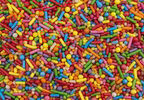 A close up of a colorful sprinkles photo