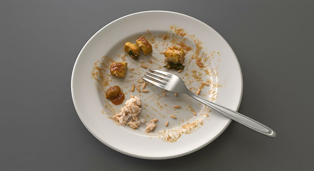 A fork and a plate with food on it photo