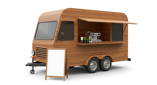Wooden food truck with a sign on it photo