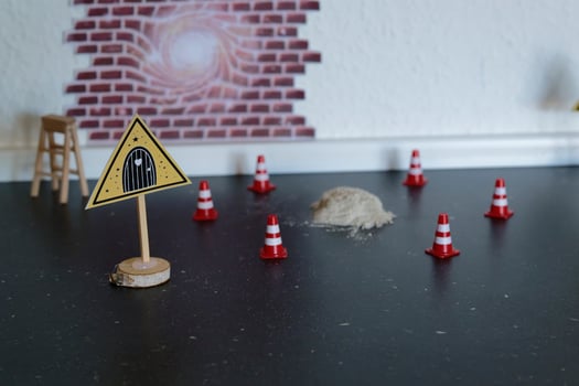 A Traditional Miniature construction scene, warning sign and traffic cones for the coming julenisse in denmark photo