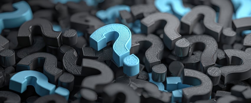 The blue question mark standing out among the black symbols of inquiry and uncertainty. photo