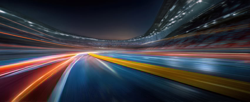The racing track illuminated with vibrant lights and dynamic motion at night. photo