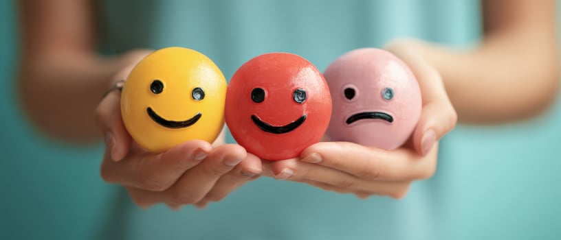 The colorful emotional expressions of happiness and sadness in vibrant balls. photo