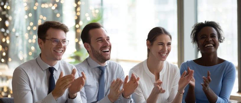 The happy team enjoying a moment of engagement and celebration together. photo