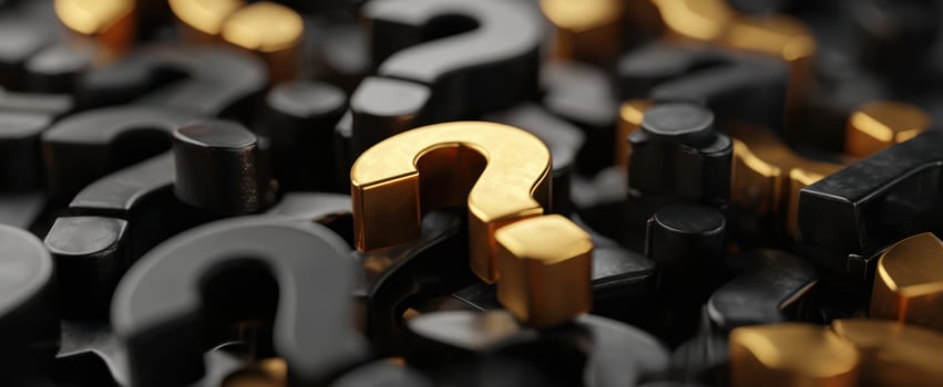 The striking golden question mark among black symbols of inquiry and curiosity. photo