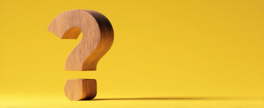 The Wooden Question Mark on Bright Yellow Background for Creative Concepts photo