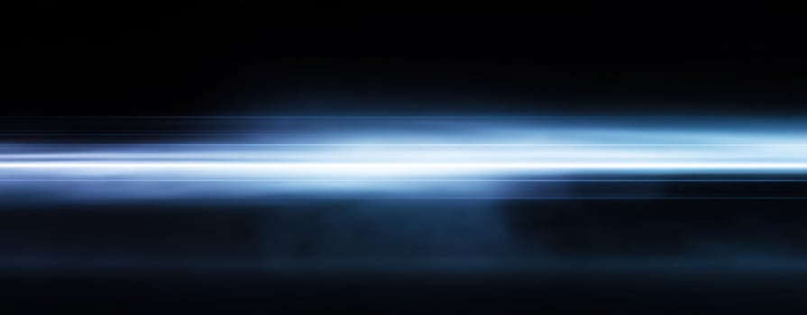 The mesmerizing light streak creating an ethereal atmosphere against a dark background. photo