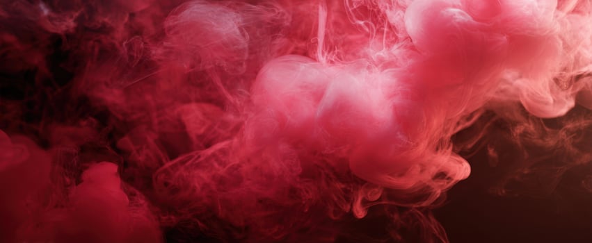 The ethereal swirl of vibrant red smoke against a dark backdrop. photo