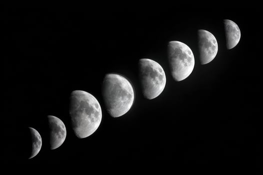 A black and white photo of the moon