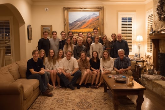 A group of people posing for a photo in a living room