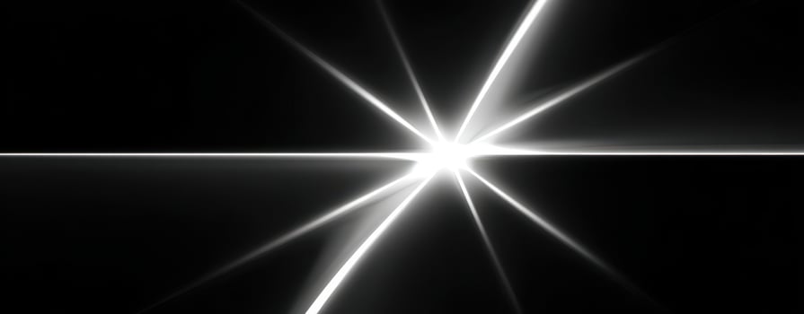 The Stunning Light Burst Illuminating a Dark Background in an Abstract Composition photo